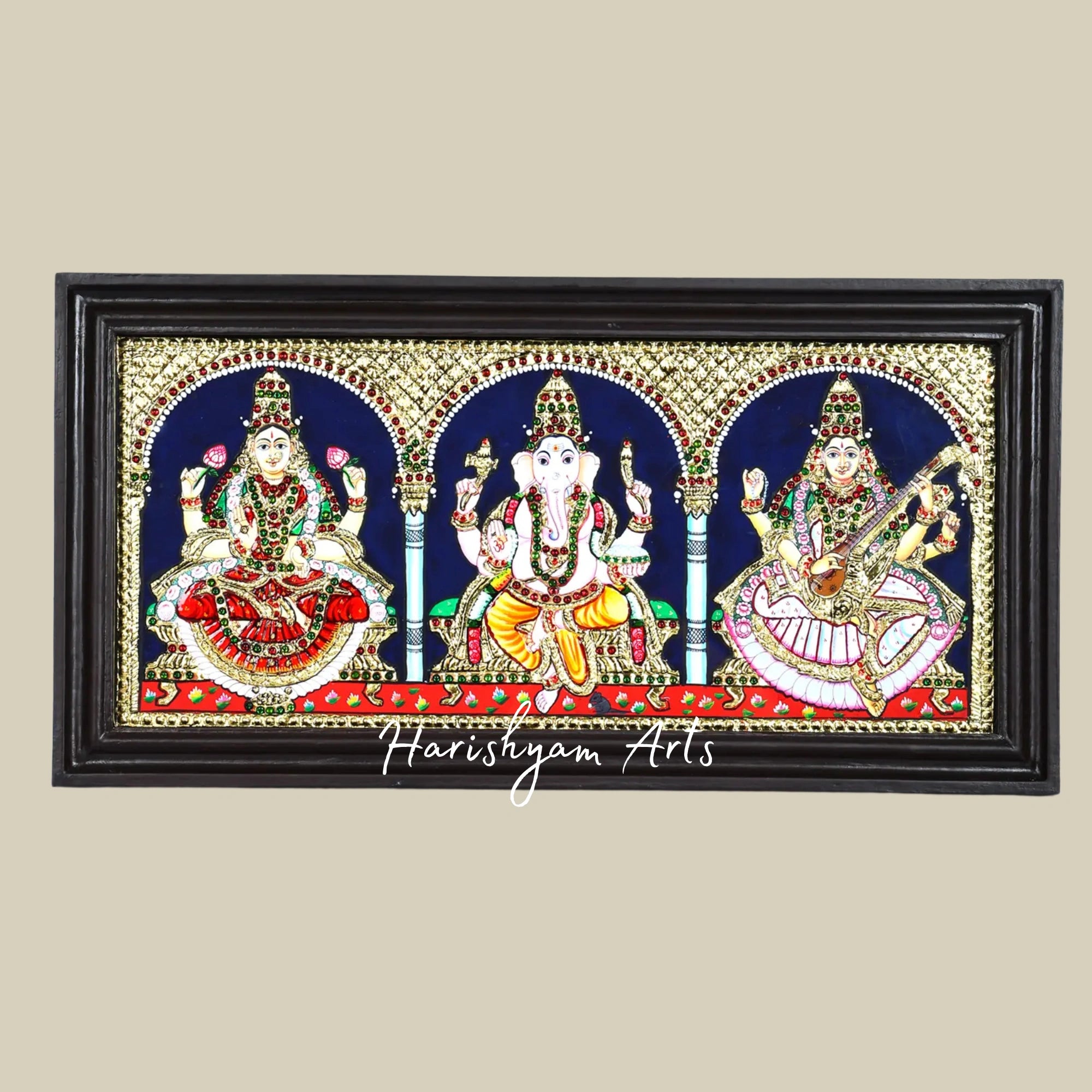 11" Lakshmi Ganesha Saraswati Tanjore Painting with Wooden Frame and Vibrant Colors