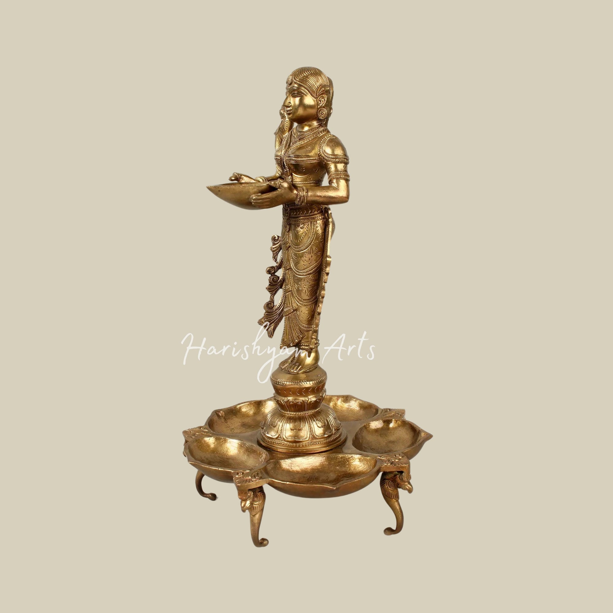 17" Graceful Deepalakshmi Holding a Lamp on a Tray of Lamps7