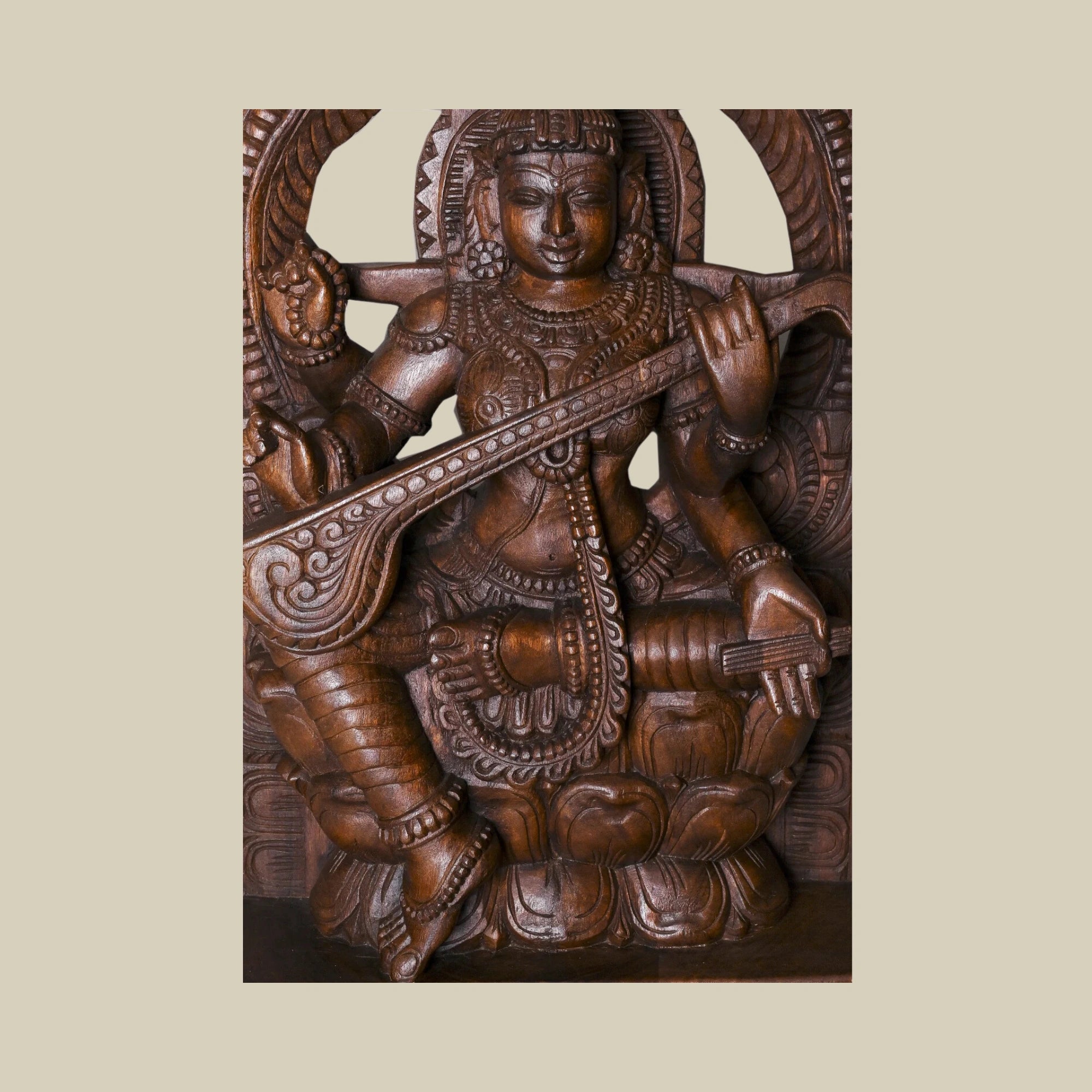 19" Handcrafted Wooden Frame of Goddess Saraswati Seated on Lotus Playing Veena