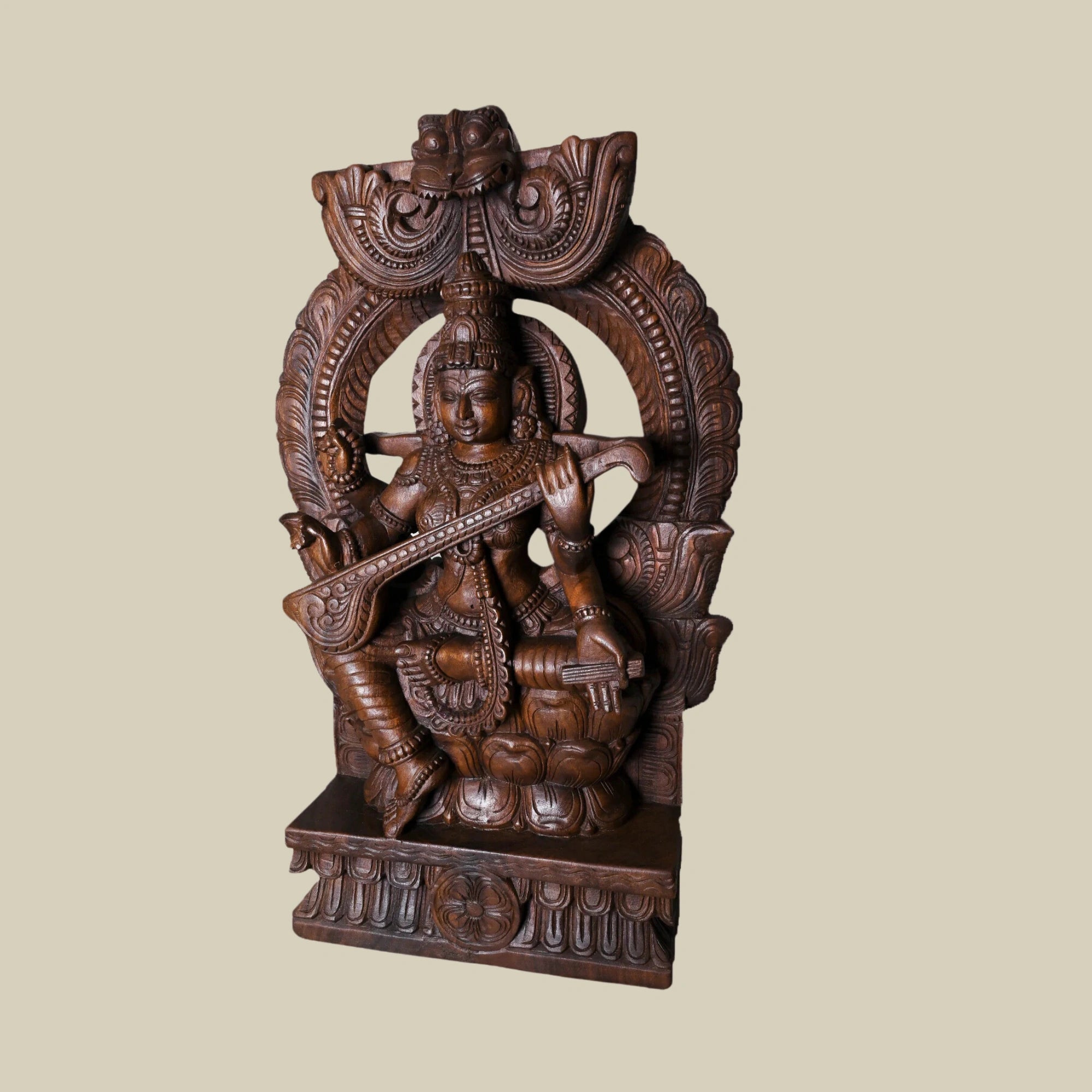 19" Handcrafted Wooden Frame of Goddess Saraswati Seated on Lotus Playing Veena