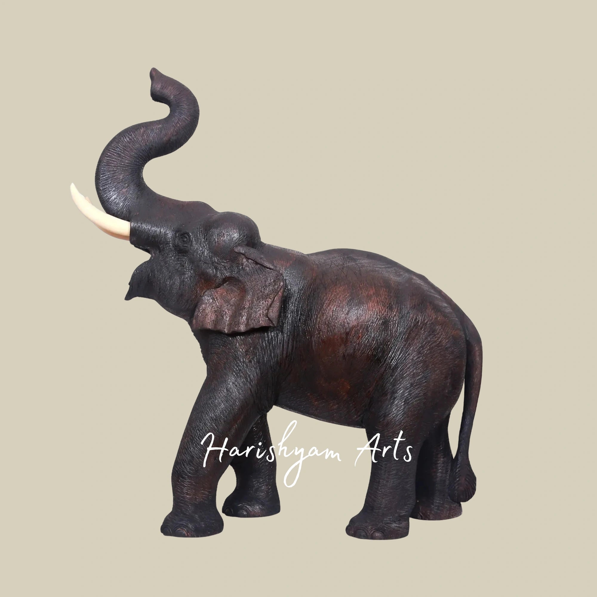 25" Handcrafted Wooden Elephant with Raised Trunk Figurine for Home Accents