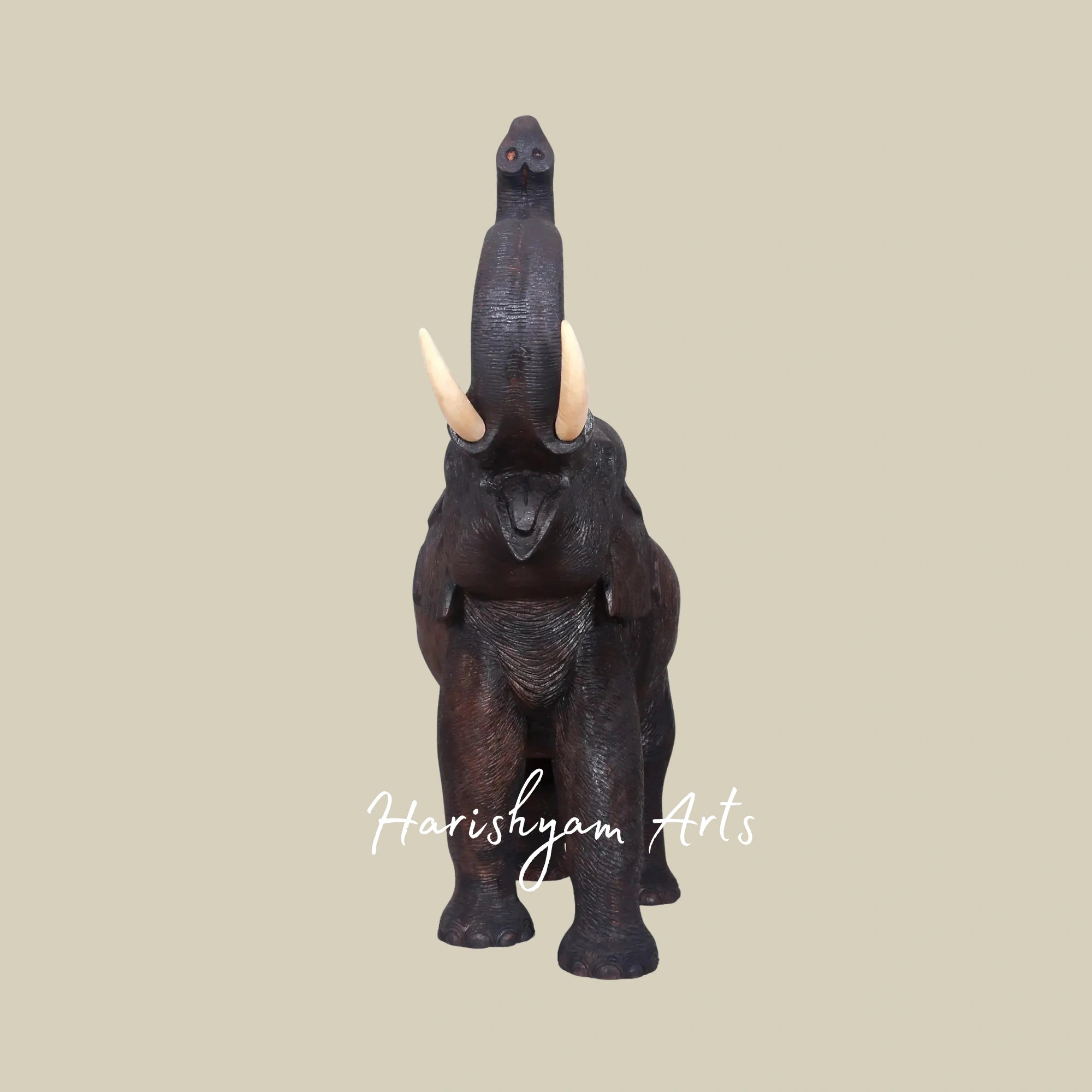 25" Handcrafted Wooden Elephant with Raised Trunk Figurine for Home Accents