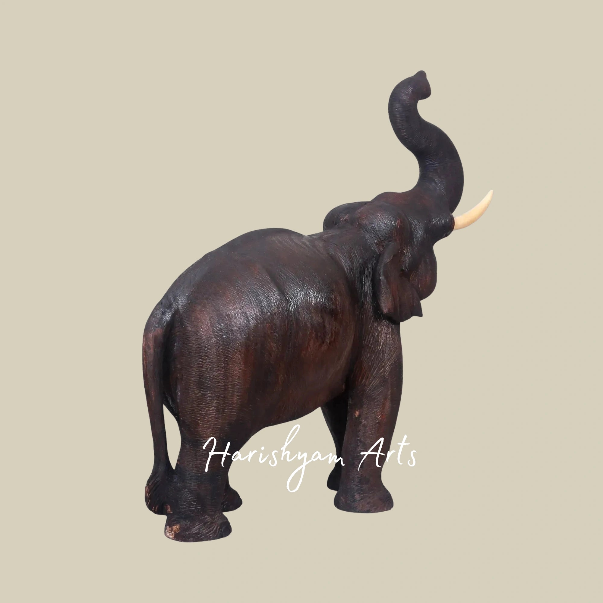 25" Handcrafted Wooden Elephant with Raised Trunk Figurine for Home Accents