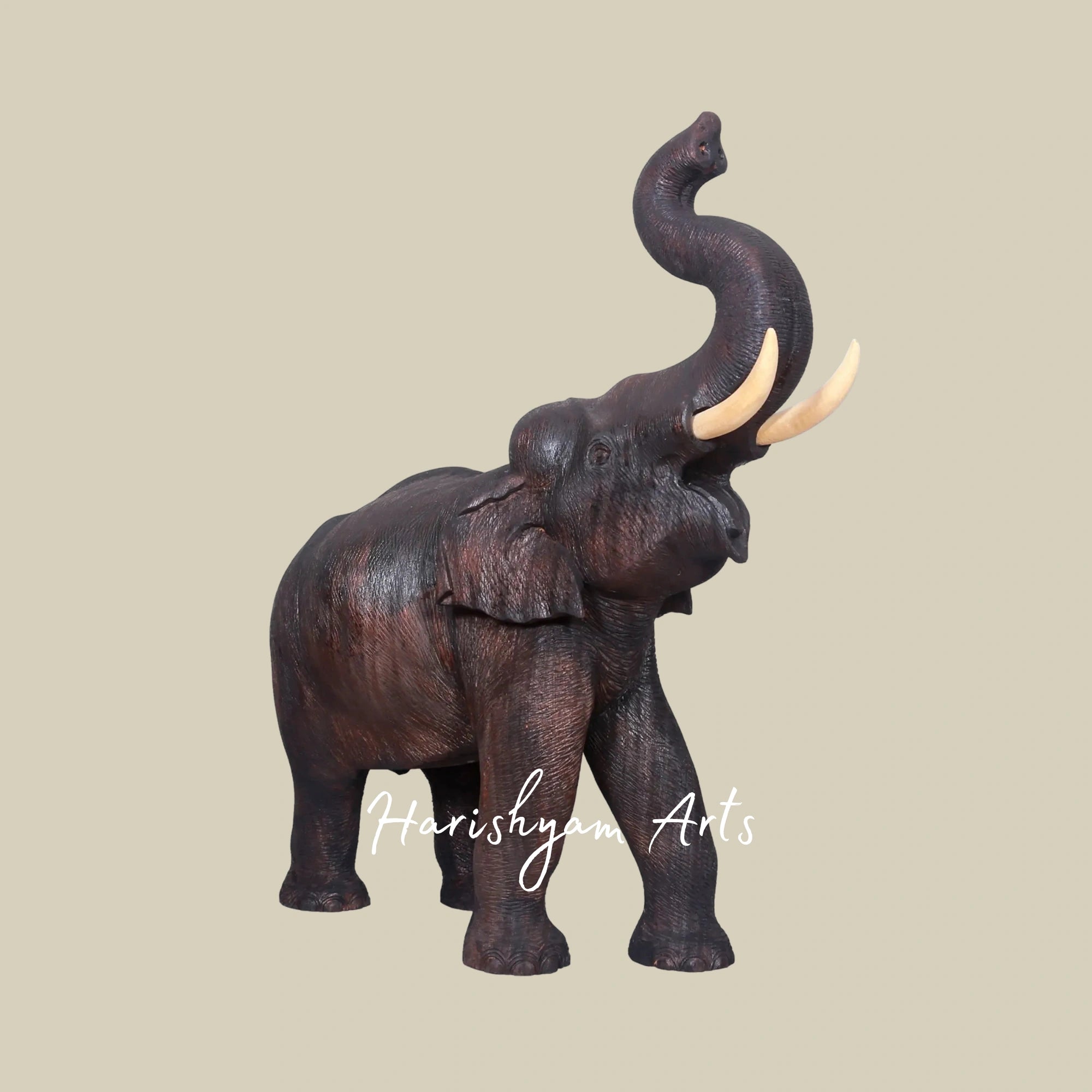 25" Handcrafted Wooden Elephant with Raised Trunk Figurine for Home Accents