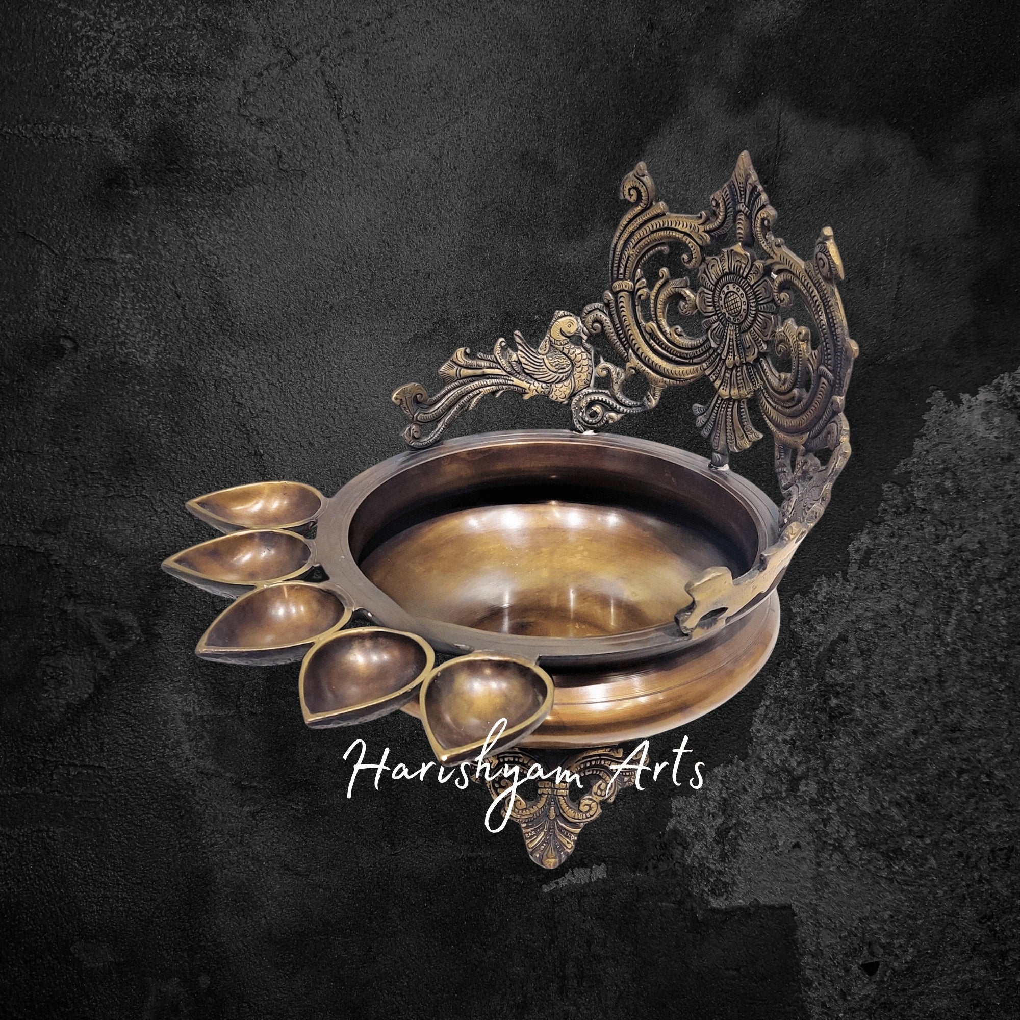 Grand Brass Panchdeep Urli Bowl with Hanging Bells and Engraved Spiral Backdrop