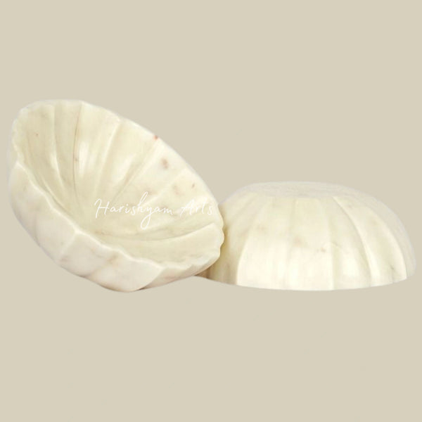Handcrafted Marble Urli with Intricate Detailing