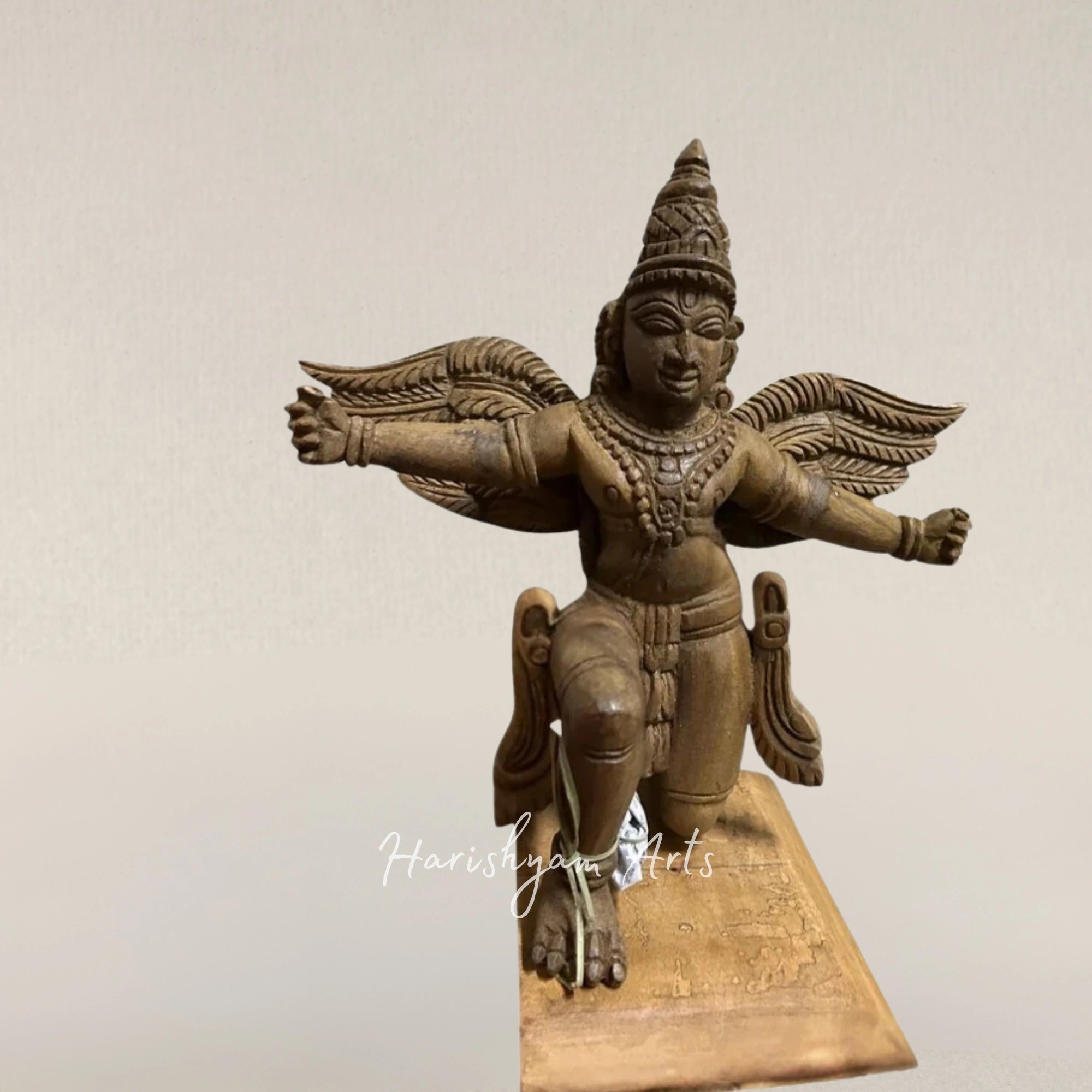 12" Hand Carved Garuda Statue Resting on Wooden Base Divine Decorative Sculpture