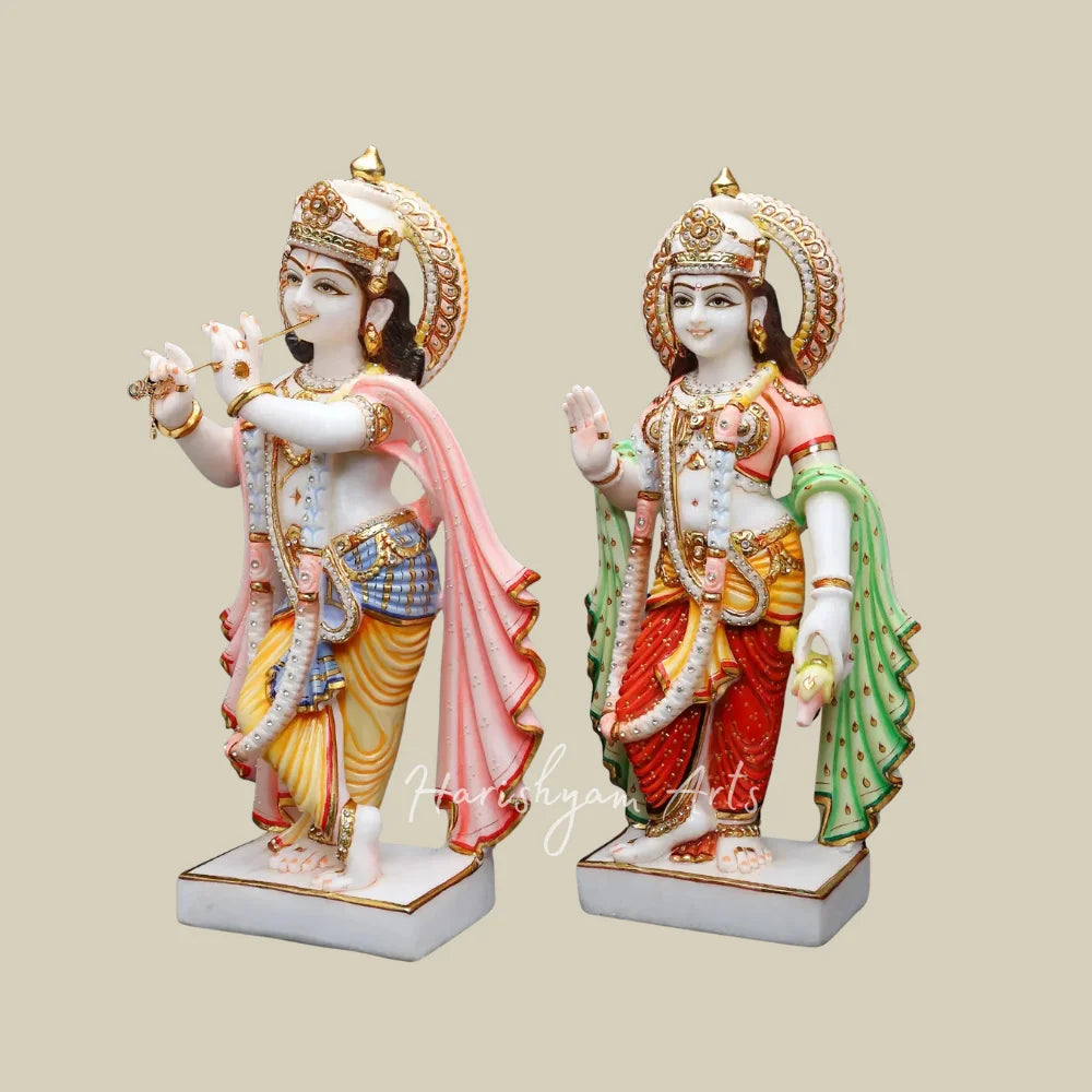 21" Colored Marble Radha Krishna Statue Pair with Flute Golden Crowns and Traditional Attire