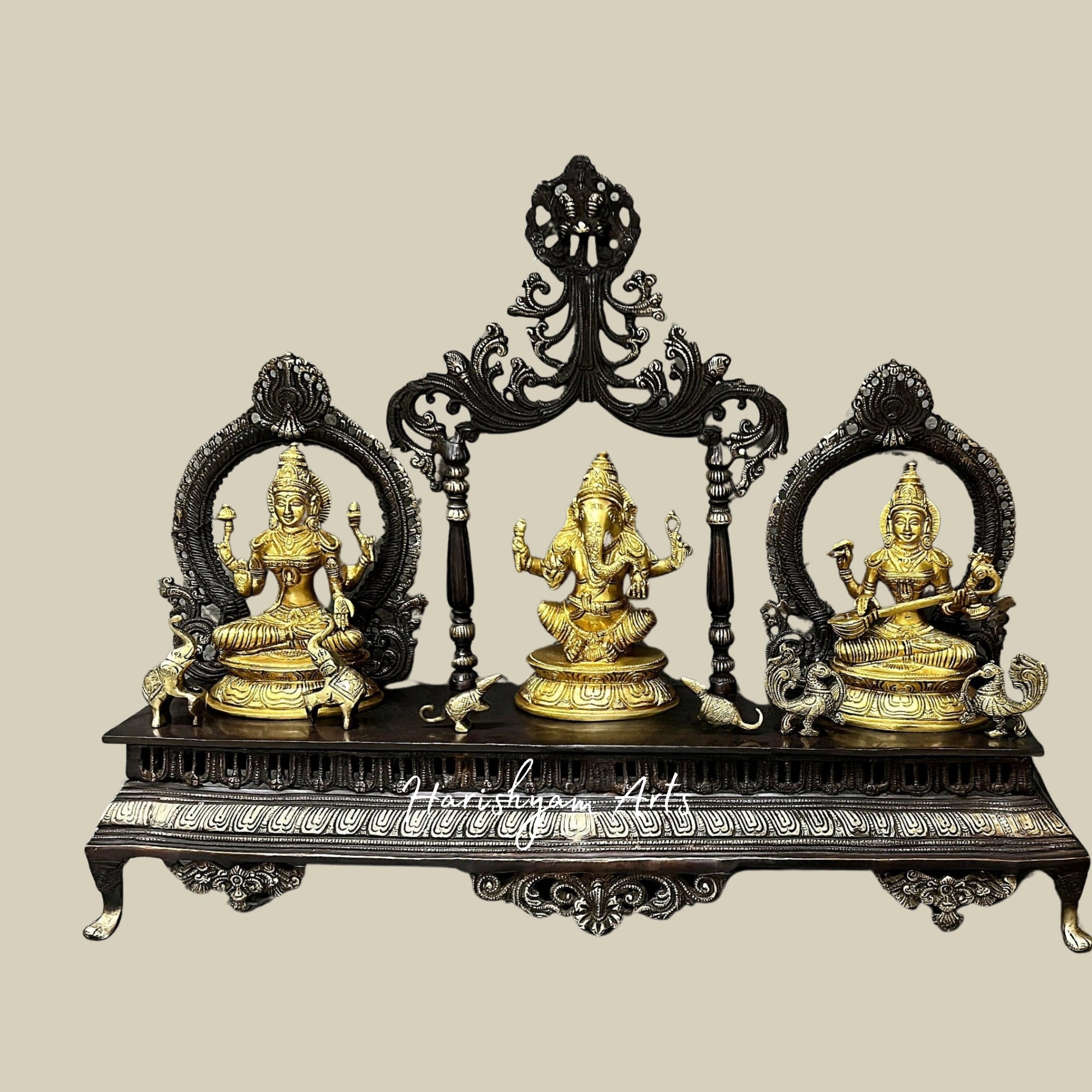 21" Elegant Brass Sculpture Set Featuring Ganesha, Lakshmi, and Saraswati