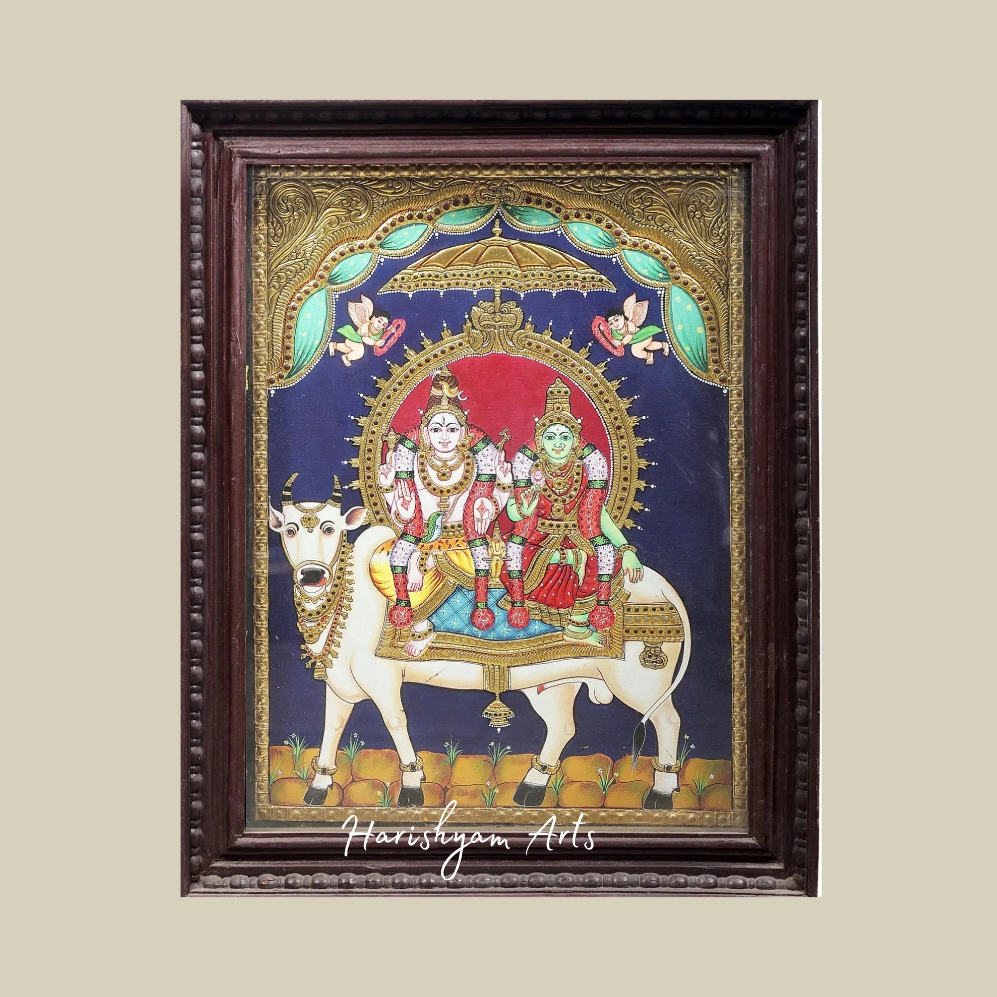 27" Lord Shiva and Parvati Seated on Nandi Tanjore Painting with Premium Teakwood Frame