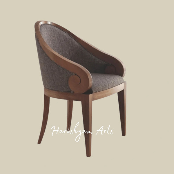 Designer Armchair with Elegant Curved Backrest and Fabric Seat