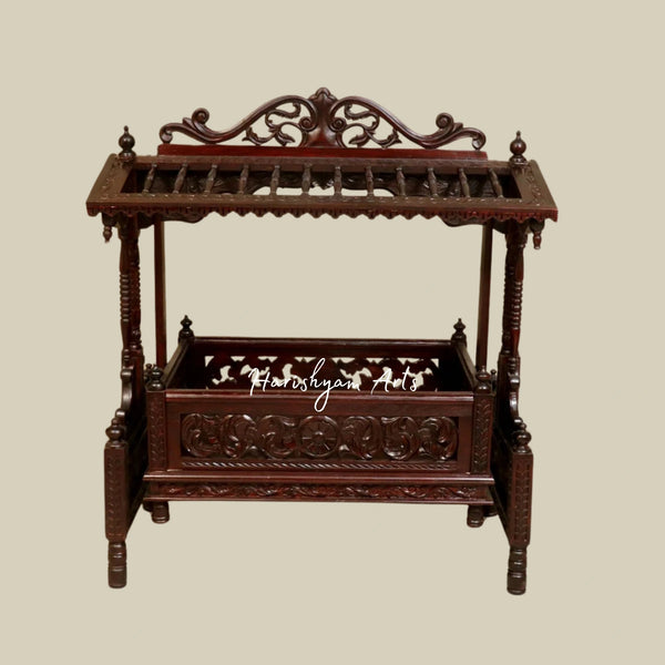 Hand-Carved Wooden Baby Cradle with Elegant Detailing