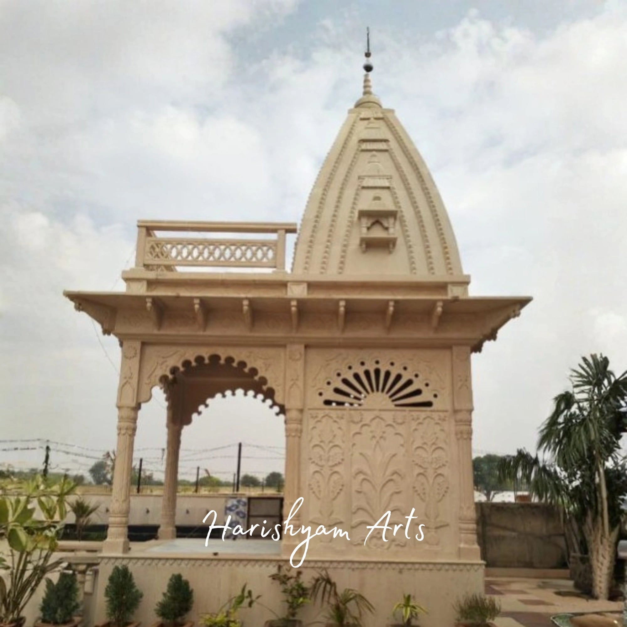 Traditional Carved Sandstone Mandir with Tall Shikhara Dome | Handcrafted Outdoor Hindu Temple Pavilion with Ornate Pillars & Arched Design