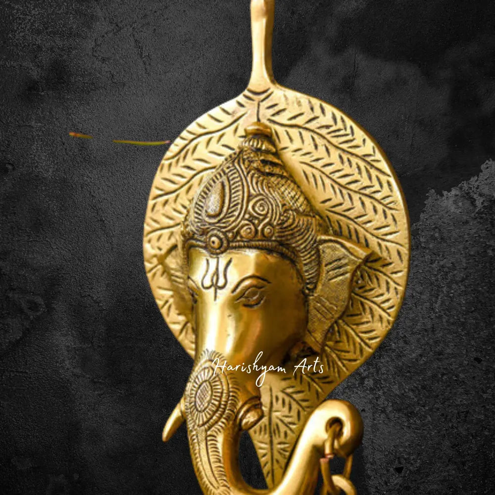 Brass Ganesha Bell on Leaf Wall Hanging 8"