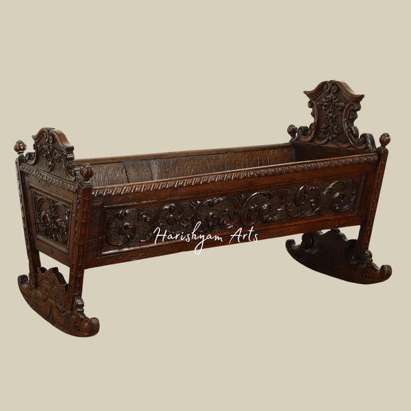 Walnut Antique Baby Cradle Bed with Carved Dolphins and Floral Designs